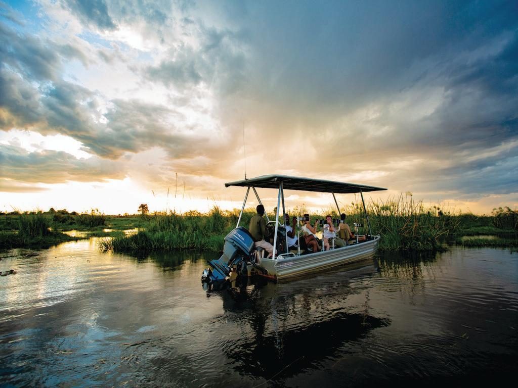 Game viewing cruise by boat on luxury safari trip