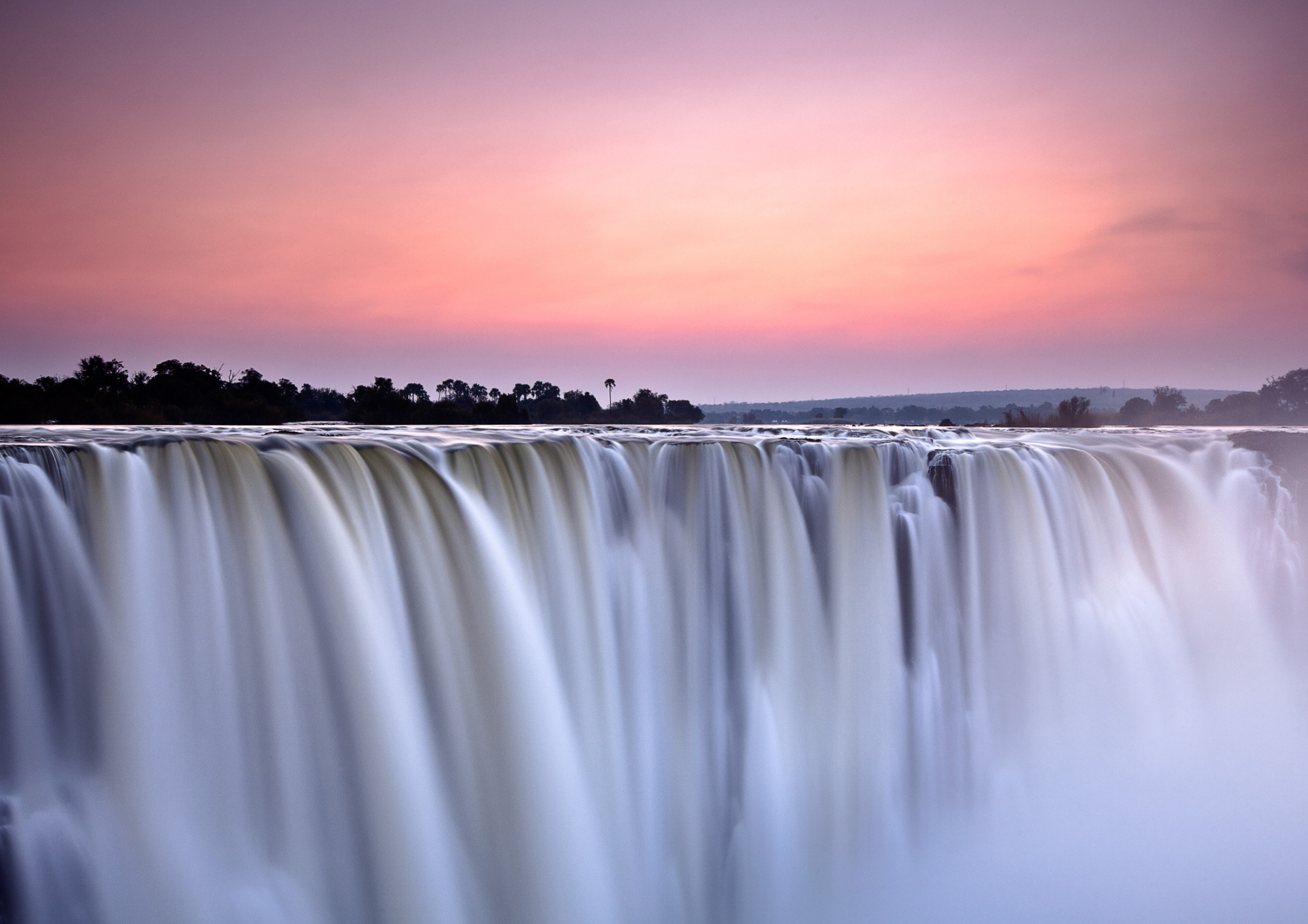Victoria falls at sunset on African Safari and beach holiday