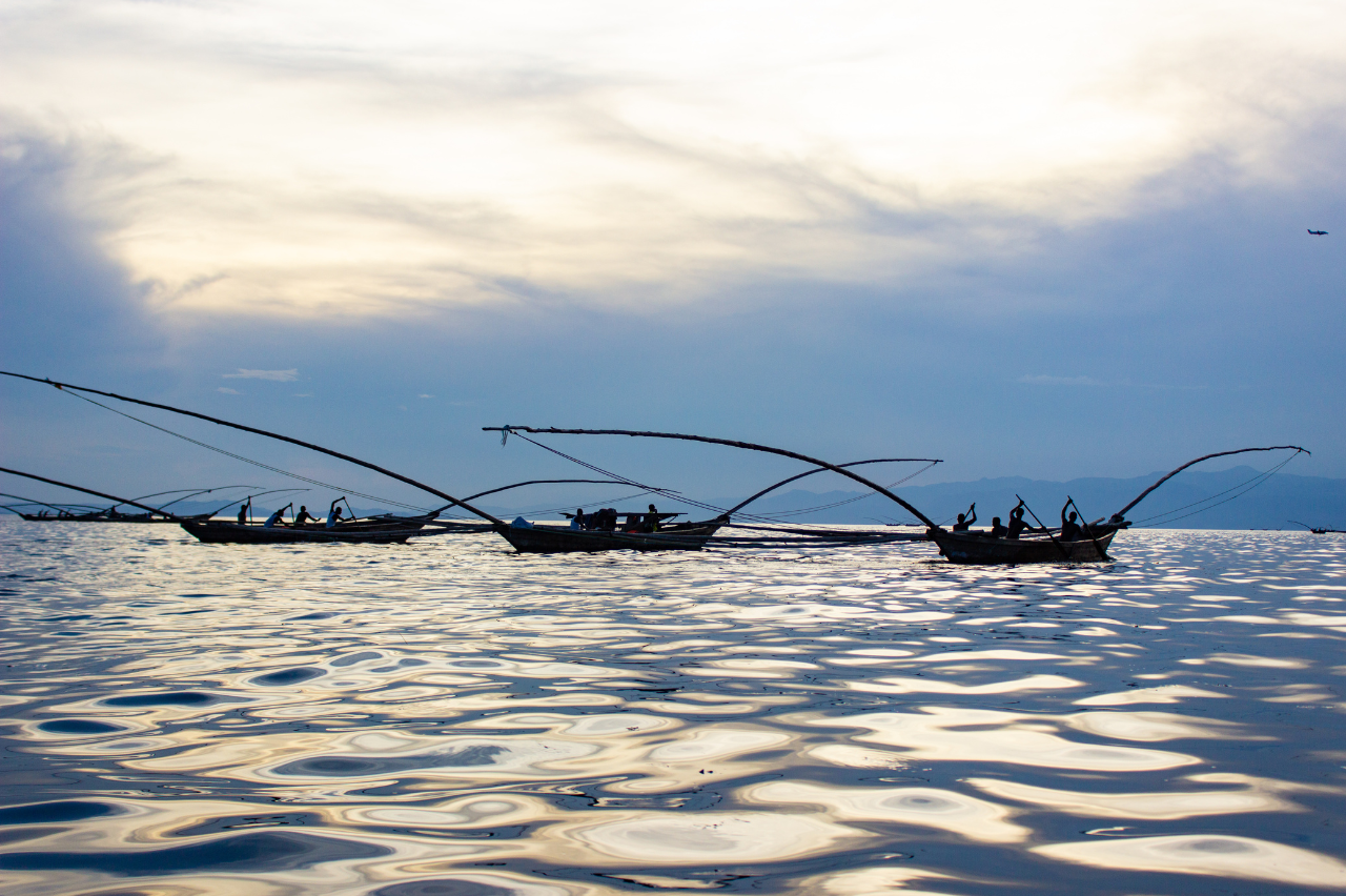 Fisherman boats on lake kivu rwanda - visit Rwanda